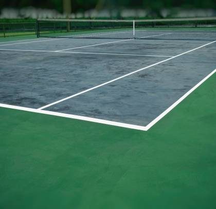 Construction court de tennis en béton poreux à lyon