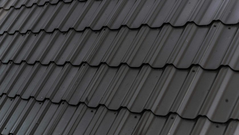 a close up of a roof with a black shinnel
